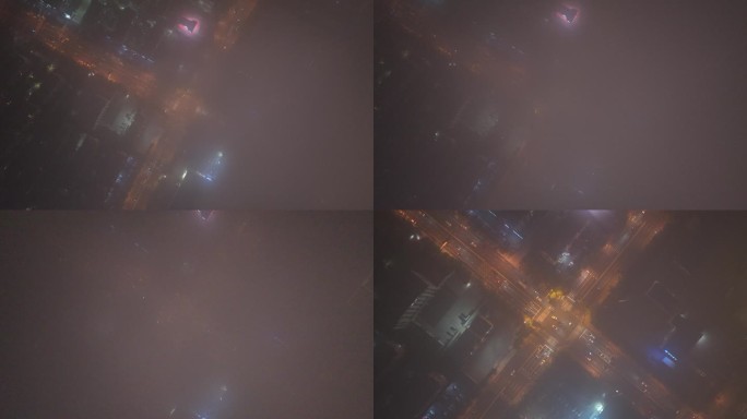 航拍俯瞰云雾下威海市世昌大道车流夜景