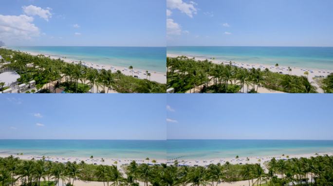 天堂般的阳光海滩，有许多热带棕榈树和大西洋碧绿的海水。从高层建筑露台上欣赏阳光岛海滩度假胜地的美景