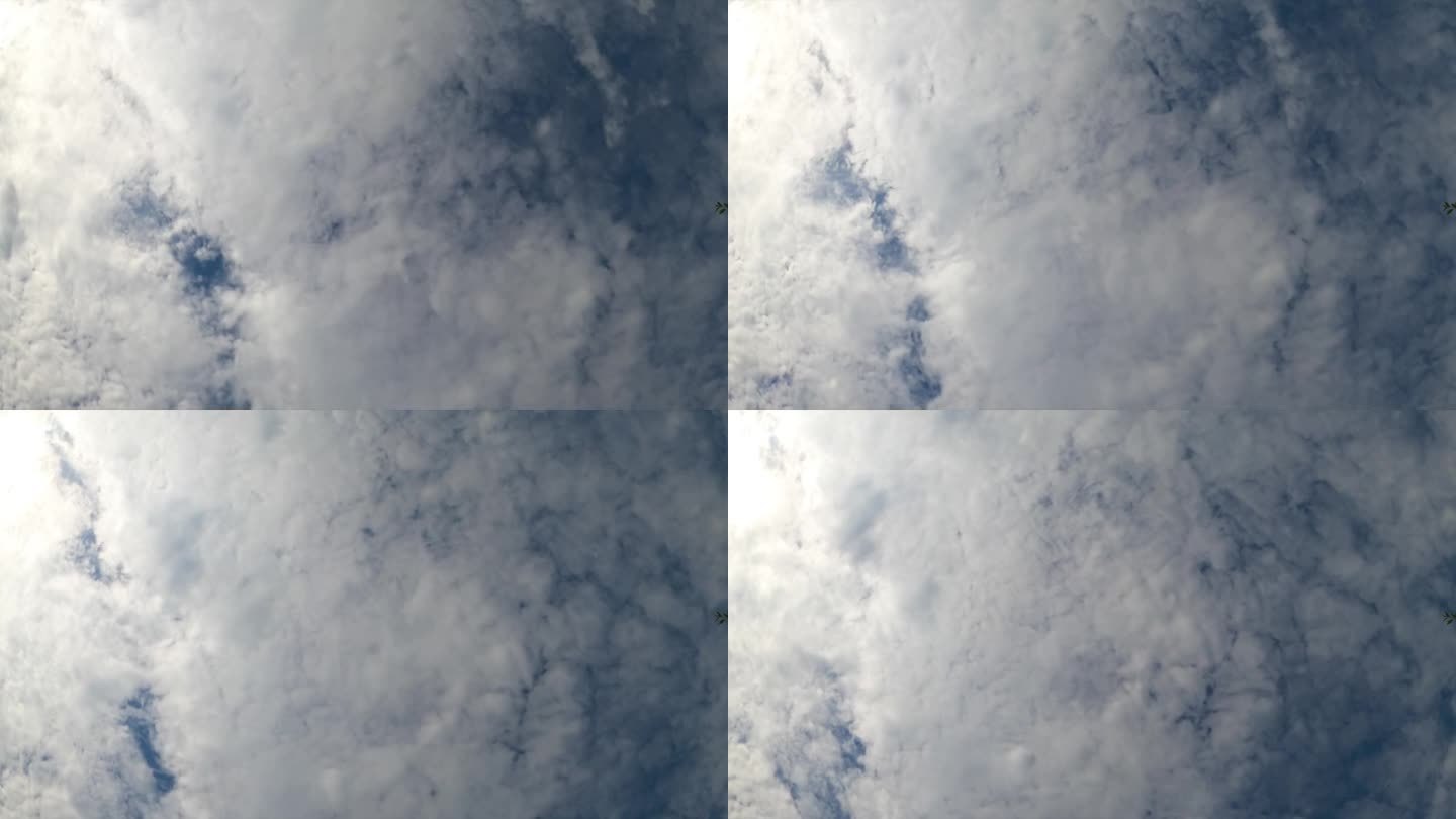 大气中雨云景观的形成。卷云覆盖着蓝天。低角度视图。