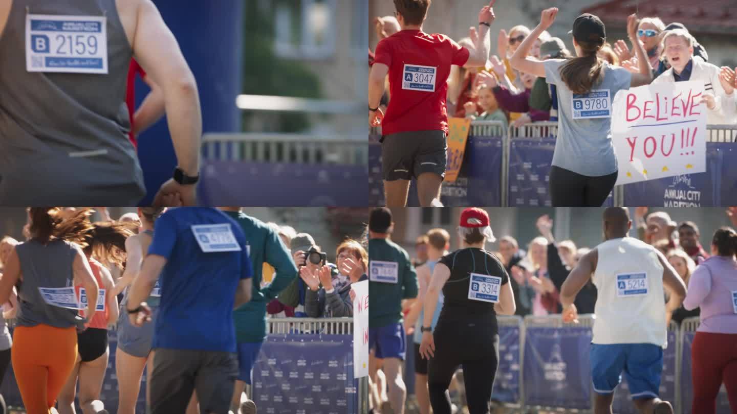 一个城市马拉松运动员背部的慢动作特写，上面有他的号码。不同的马拉松选手在比赛中争夺第一名，向观众中的