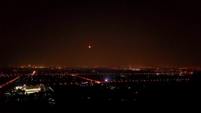 鬼笑石俯拍北京夜景红月亮月升延时 组镜1