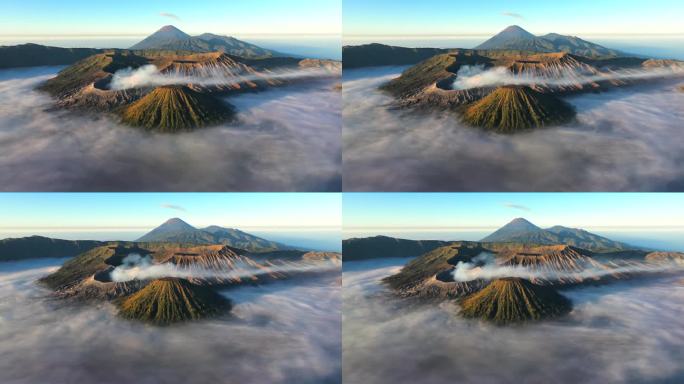空中无人机超缩日出场景移动的云，雾和烟雾的喷发覆盖火山Mts. Bromo，塞默鲁，巴托克和威达顿，