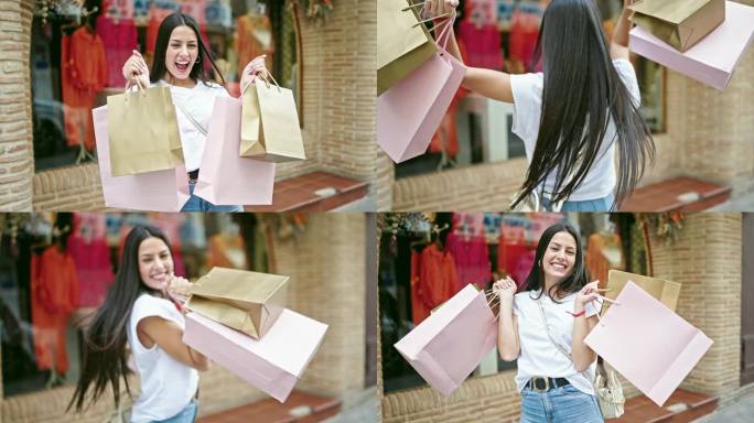 年轻漂亮的西班牙女人去购物，拿着袋子独自在服装店转