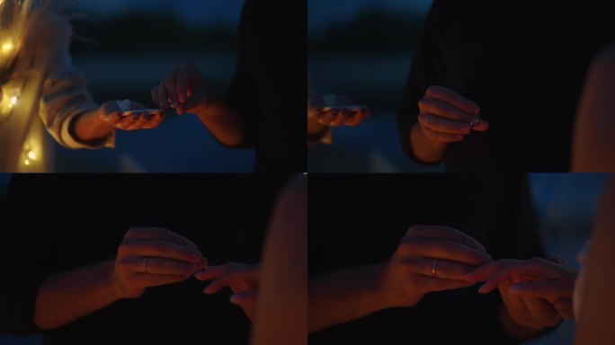 浪漫的婚礼在夜晚，交换戒指，新郎拿戒指，戴上手指