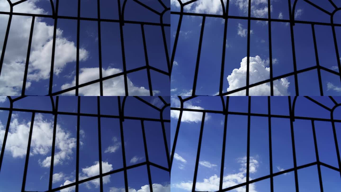 铁窗外的蓝天白云延时摄影