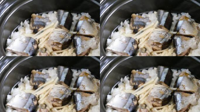 一段辣米的视频。白米饭:在陶锅里煮的一盘刀菜和白米饭