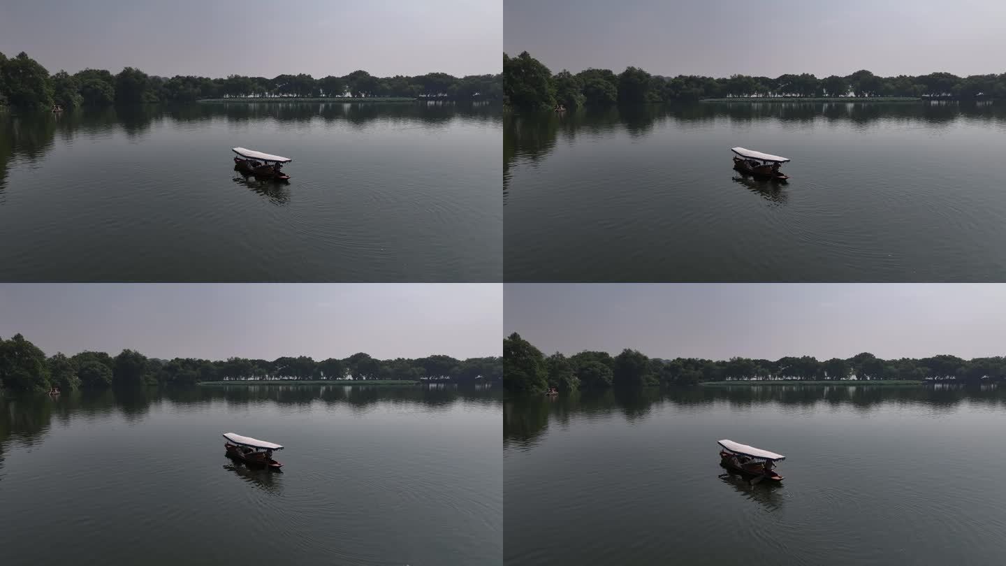 航拍杭州西湖摇橹船手划船