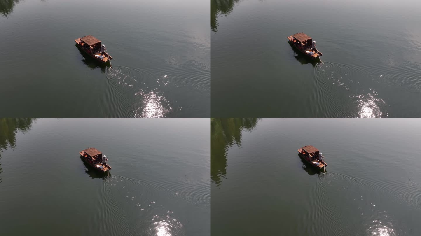 杭州西湖摇橹船手划船