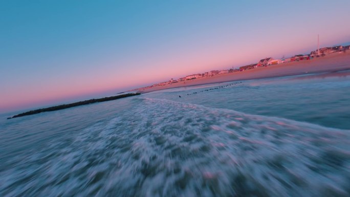 FPV穿越机无人机航拍海边日出沙滩海浪鸟