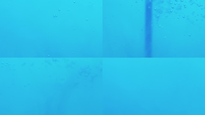 水下用稻草混合蓝墨水的慢动作镜头