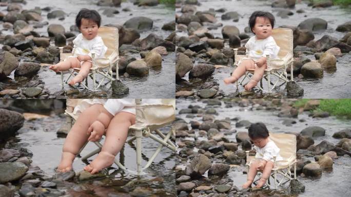 小孩子小溪边玩水着凉