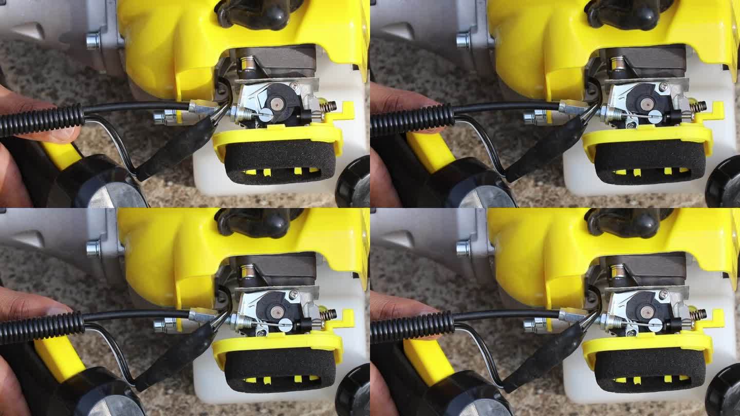 节气门触发器或加速杠杆被拉，而它是显示动作的发动机在一个刷子切割机。刷刀是如何工作的