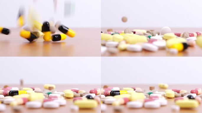 把各种颜色的药片和胶囊倒在桌子上。