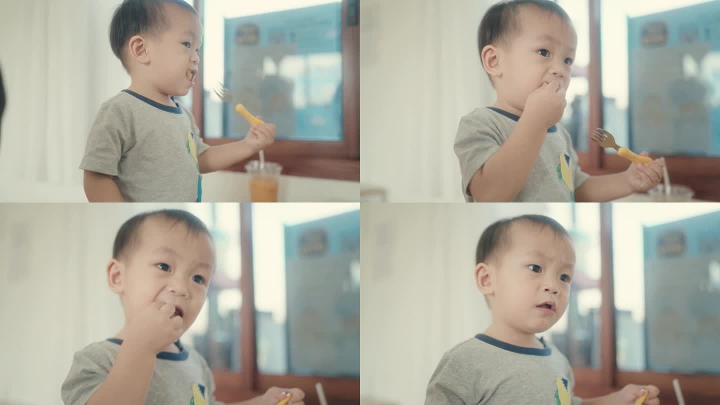 活力与幸福:亚洲男孩吃薯条的快乐时刻