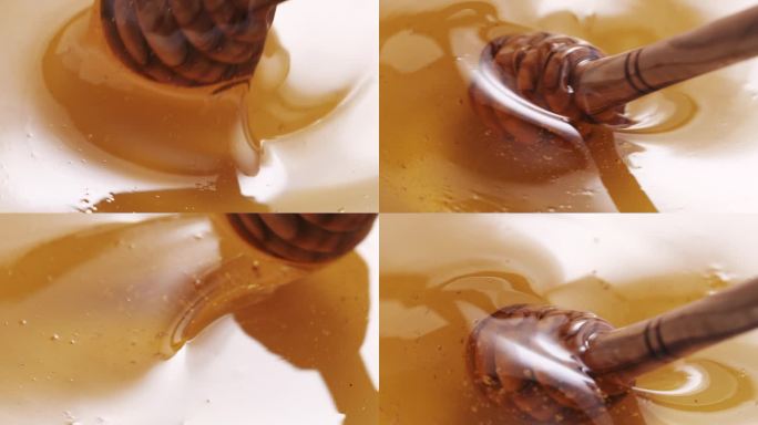 用木勺缓慢搅拌蜂蜜