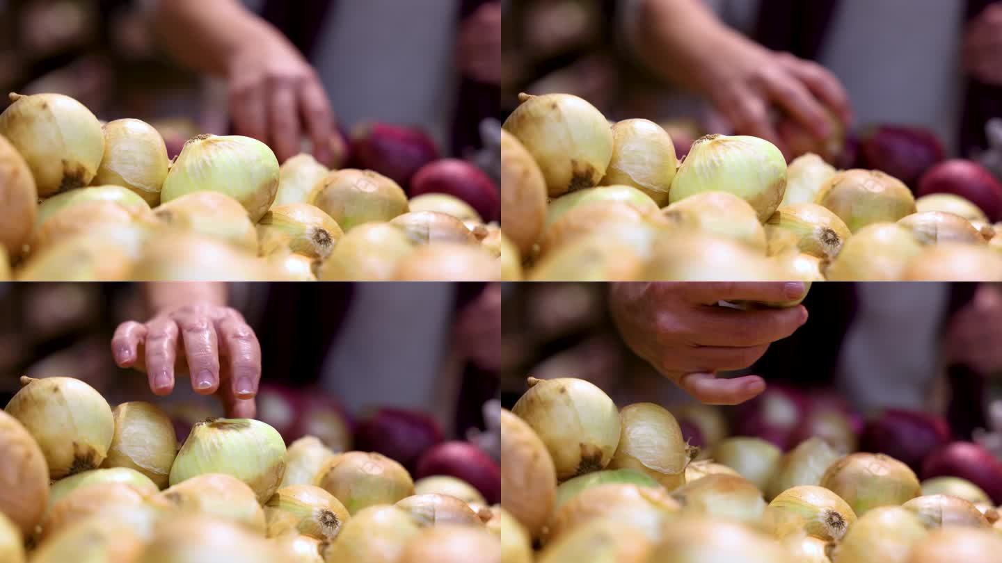 一个面目全非的女人在农贸市场上抢洋葱