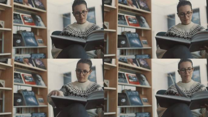 微笑和美丽的女人喜欢在图书馆看书。冰岛