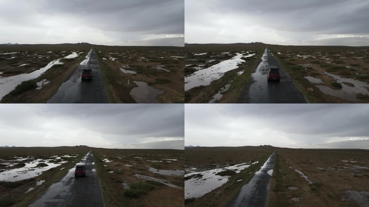 汽车行驶在内蒙古大草原航拍
