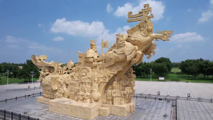 航拍殷墟文化遗址广场前的巨型雕塑