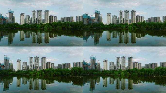 成都东湖公园蓝天白云美丽公园城市镜面对称