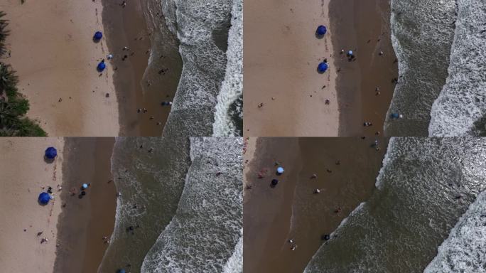 航拍阳光沙滩海浪人群