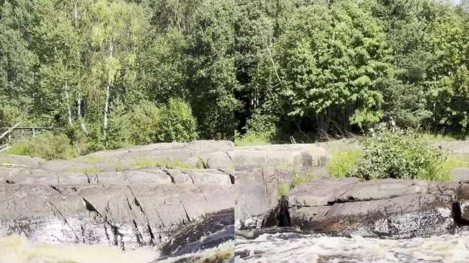 奥卢，芬兰- 2023年6月8日:Koitelinkoski急流，垂直