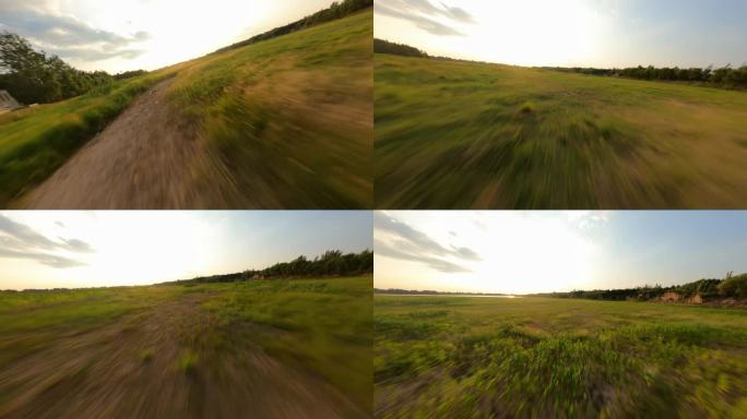 FPV拍摄黄昏在草原上贴地飞行