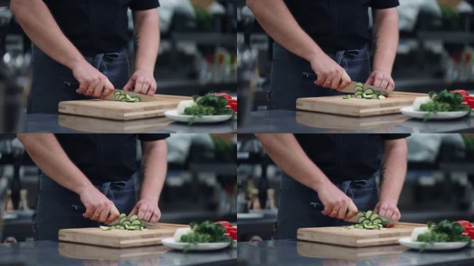 厨师在餐厅的厨房里做蔬菜沙拉，手在菜板上用刀的特写