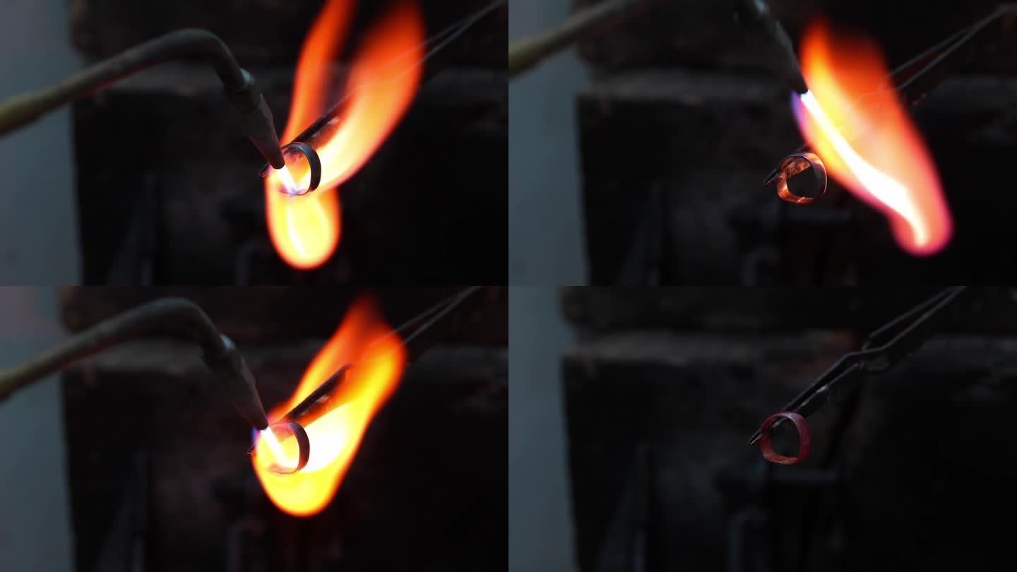 金匠珠宝商使用火炬加热金金属戒指的制作过程