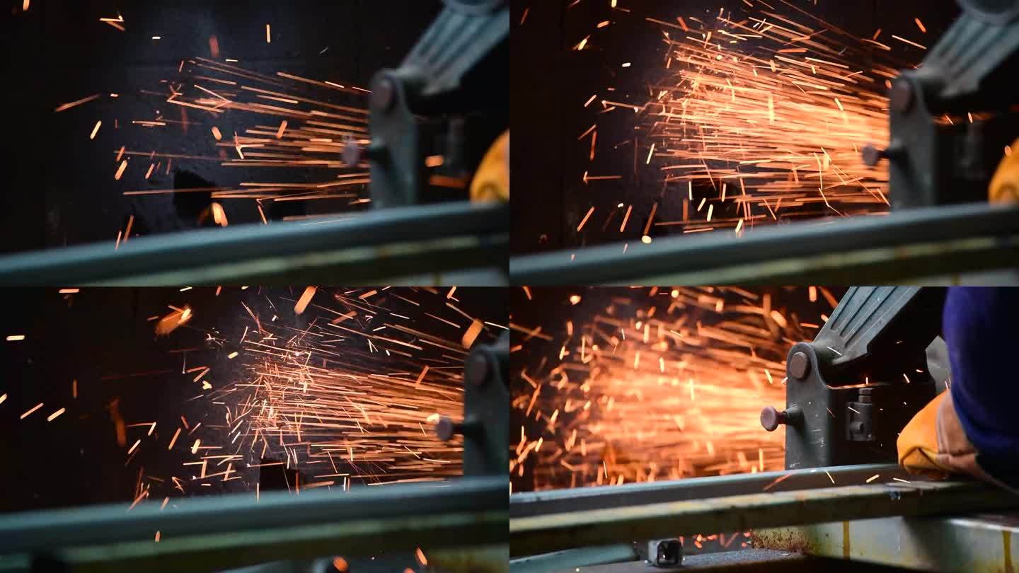 焊机铁金属有火花。热焰焊接金属工作切割火铁车间。钳工用焊机切割金属加工磨床。近距离的手在金属加工火花