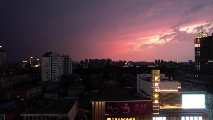 山东淄博晚霞城市夜幕降临夜景灯光航拍