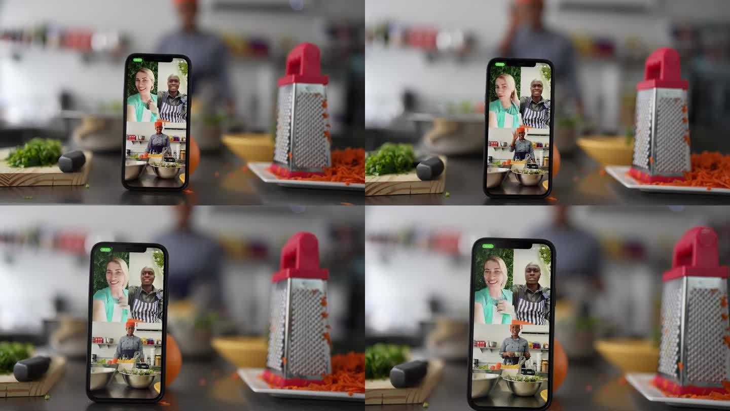 厨师在手机上教学生虚拟烹饪课