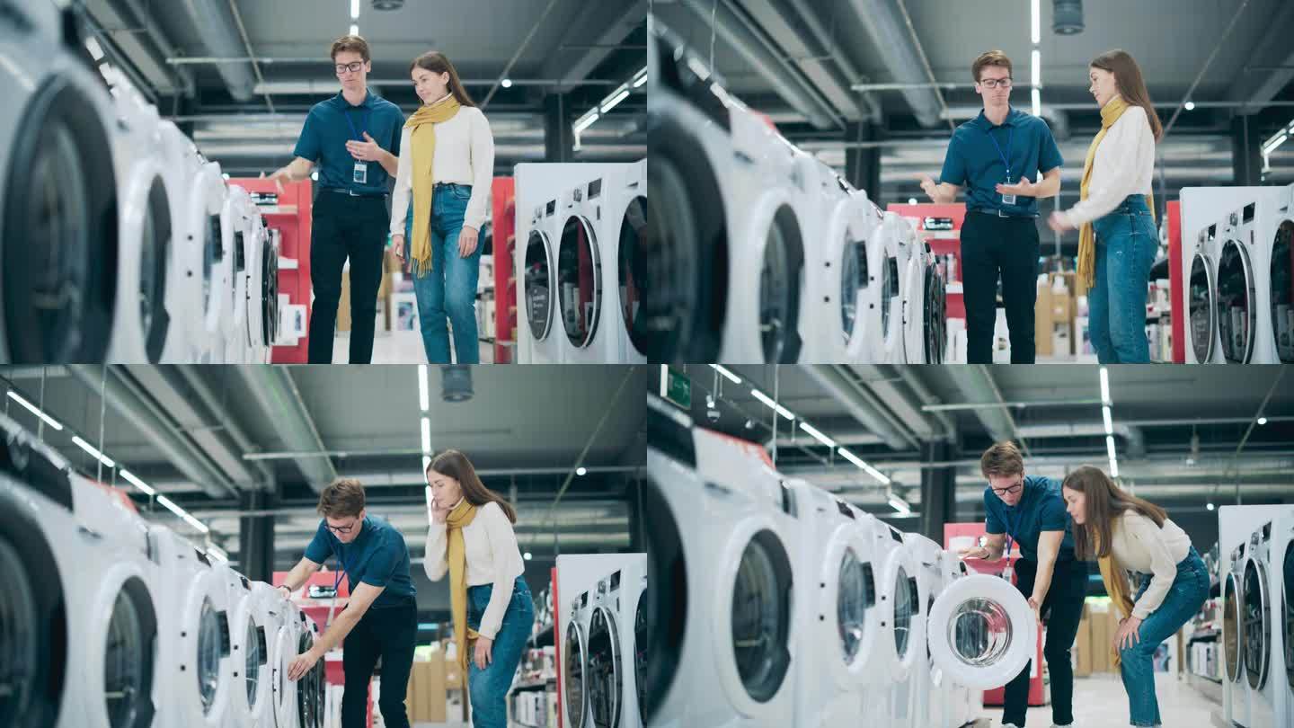 穿着随意的女人与家电商店的店员讨论洗衣机的选择。年轻的购物者在陈列室检查现代洗衣器具的选择