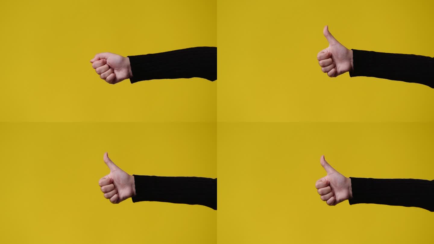 一个女孩在黄色背景上竖起大拇指的4k视频。