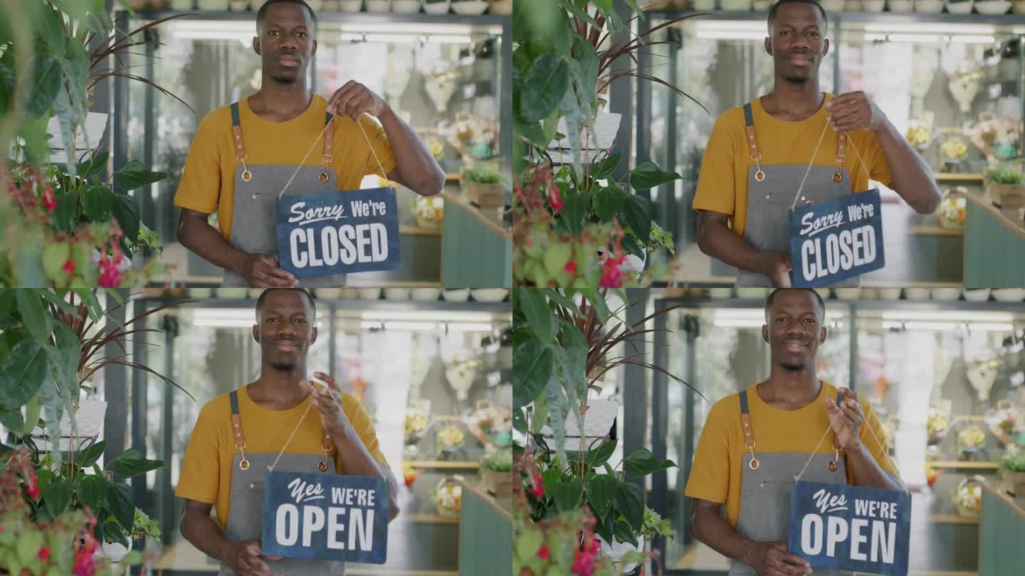 花店老板的肖像，非裔美国商人转身，对不起，我们关门了，牌子上写着，是的，我们是开放的