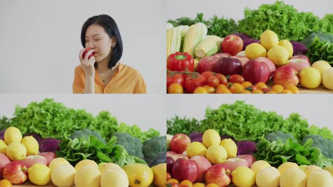 女人闻新鲜蔬菜水果