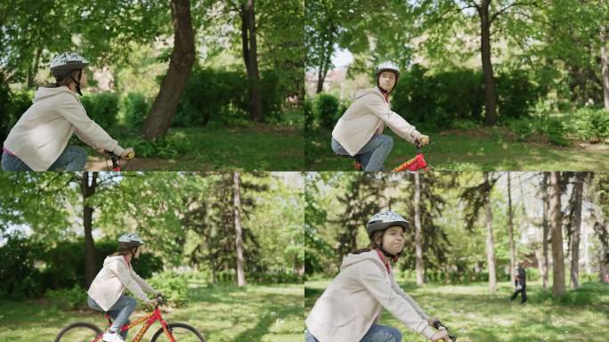 一个十几岁的女孩戴着头盔在公园里骑自行车