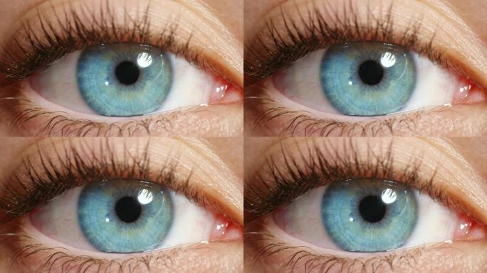 视觉上，清醒人的蓝眼睛和宏观看着美丽而自然的虹膜颜色。在验光测试中，瞳孔移动的人的健康、孤立和令人惊
