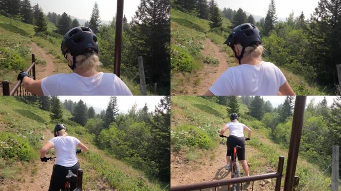 第一人称视角的老年妇女骑自行车在山路上