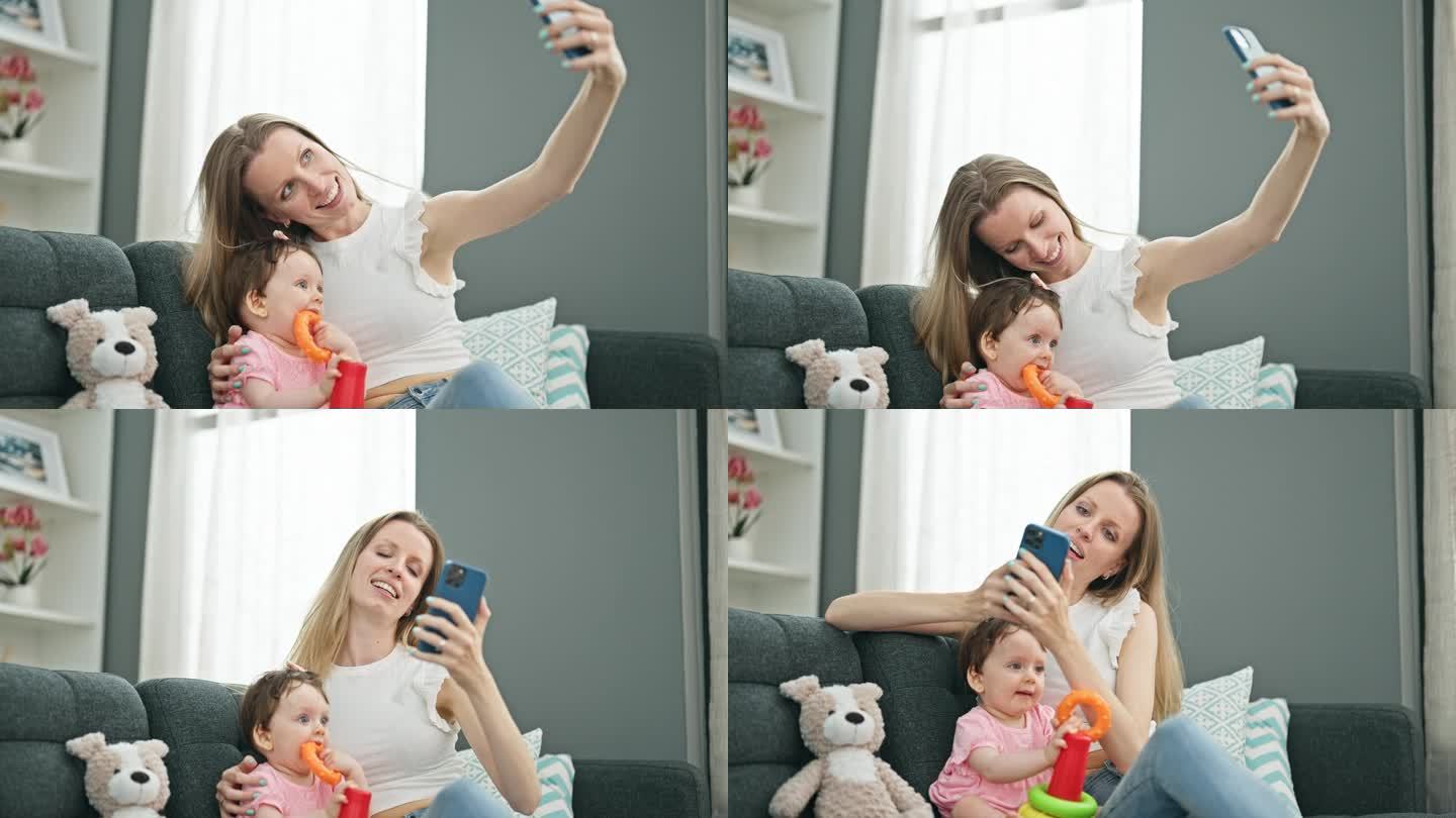 母女俩在家里玩篮球时用智能手机自拍