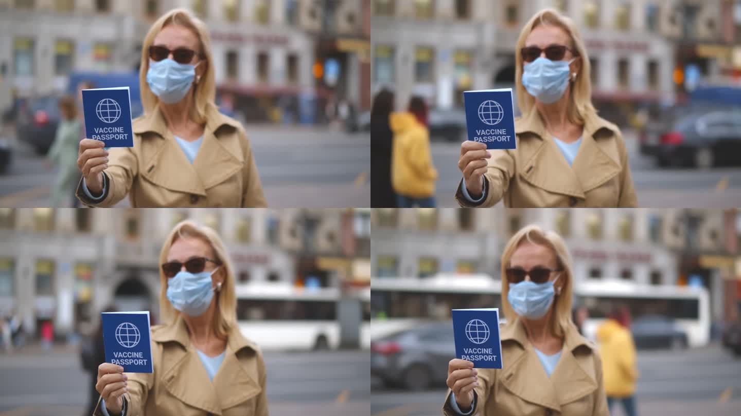 成年妇女的肖像，戴着口罩，在镜头前展示疫苗护照