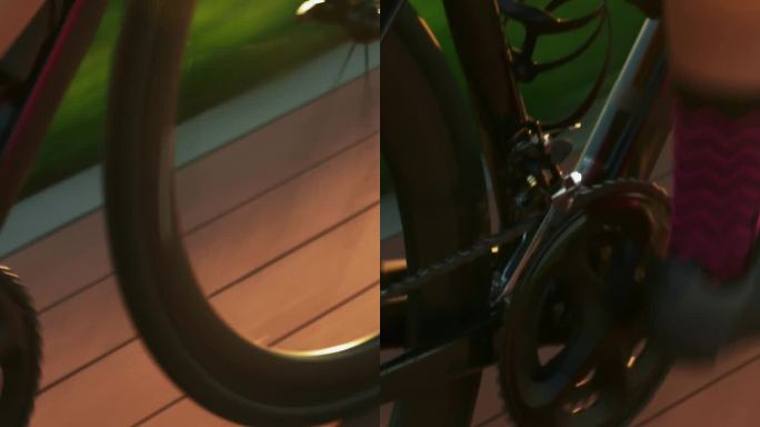 自行车车轮转动，自行车卡带和链条，拉近距离。垂直视频
