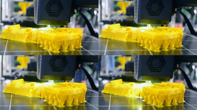 3 d打印机。3D打印机打印过程特写。3D打印机用熔融塑料制造物体。3 d打印技术。创新增材机器人技