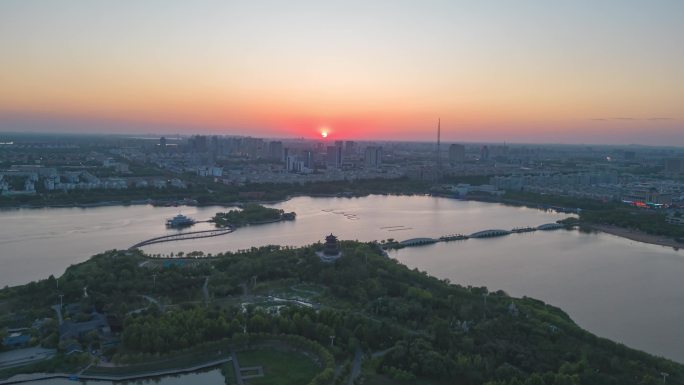 航拍东营日落延时清风湖日落延时