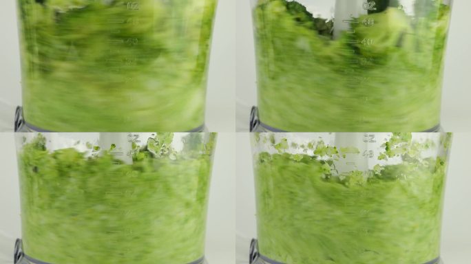 青花菜花在搅拌器的碗里切碎。