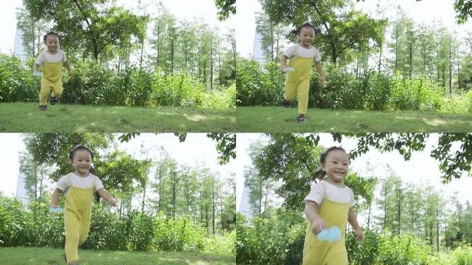 小女孩在公园奔跑小孩草地奔跑
