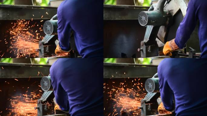 焊机铁金属有火花。热焰焊接金属工作切割火铁车间。钳工用焊机切割金属加工磨床。近距离的手在金属加工火花