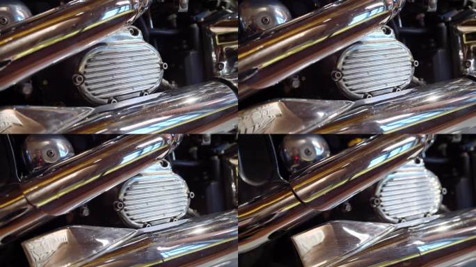 多莉拍摄的有光泽的抛光排气管在老式自行车上。复古摩托车细节。