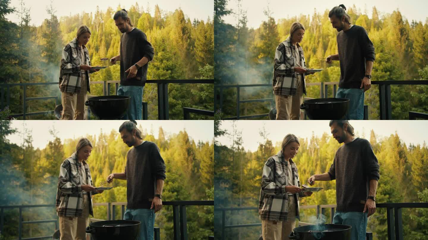 一个穿棕色毛衣的黑发男人和一个金发女孩在针叶林中的一座乡村别墅的阳台上用特制的烤架煎烤肉