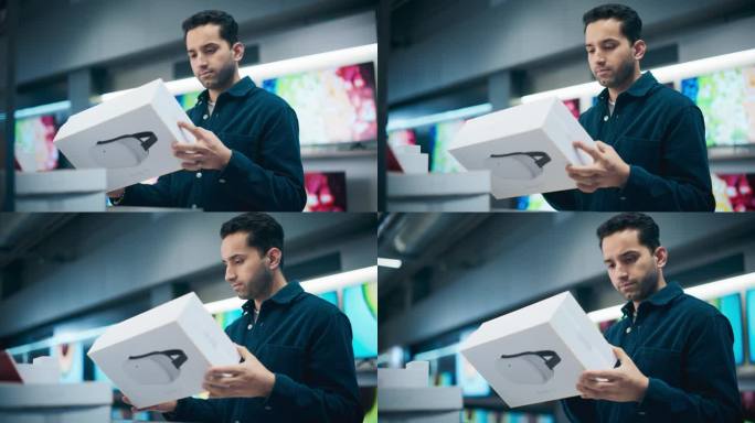 一个时髦的西班牙裔男子的肖像，看着一个带有现代VR耳机的盒子，阅读模型的规格和功能。客户在家电商店购